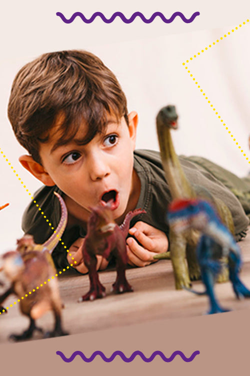 Niño jugando con dinosaurios  - Didactijuegos